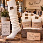 Ivory Peek Breeze leg warmers on display in a cozy boutique