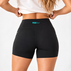 Back view of the black MOVE high-rise bike shorts with Peek Breeze logo