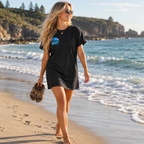 Black Nomad T-shirt dress worn on the beach