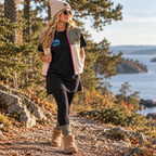 Black Nomad T-shirt dress worn with leggings and a Peek Breeze fleece vest