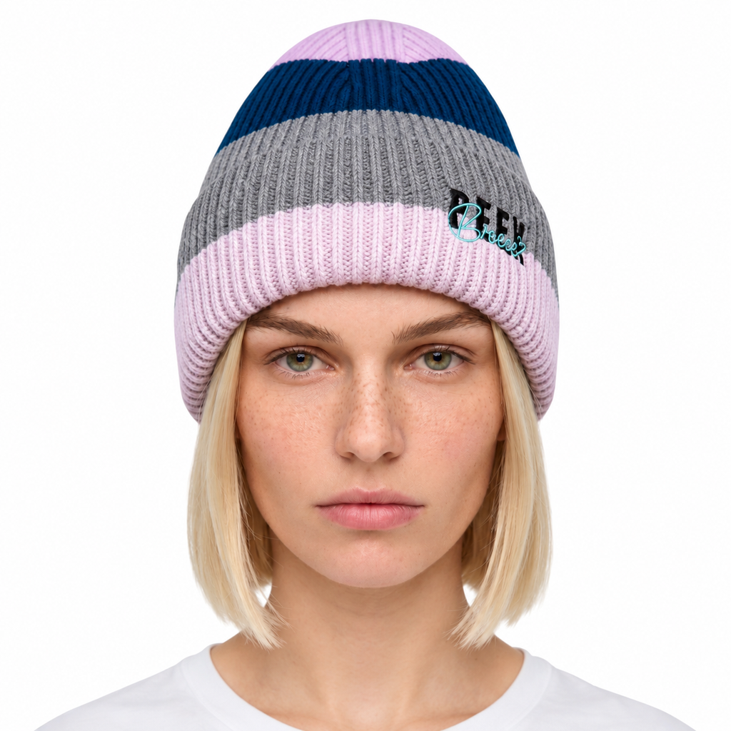 Woman wearing the Ibiza Peek Breeze ribbed knit beanie in lilac, gray and navy
